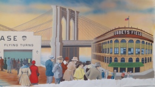 the bridge and the Ebbets Field are composed into the painting, they are not in Coney Island